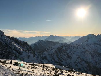 Scenic view of mountains against sky during sunset