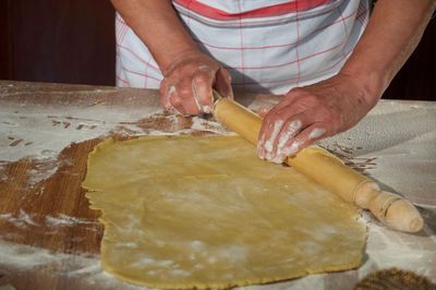 Close-up of man preparing food