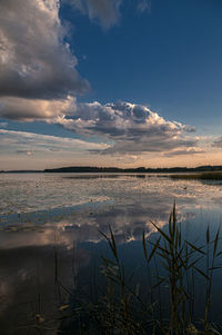 Scenic view of sea against sky at sunset