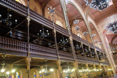 Low angle view of illuminated ceiling