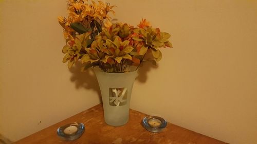 Close-up of flower vase on table