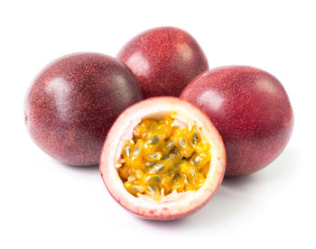 Close-up of fruits against white background