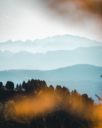 Scenic view of mountains against sky during sunset