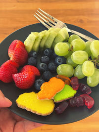 High angle view of strawberries on table