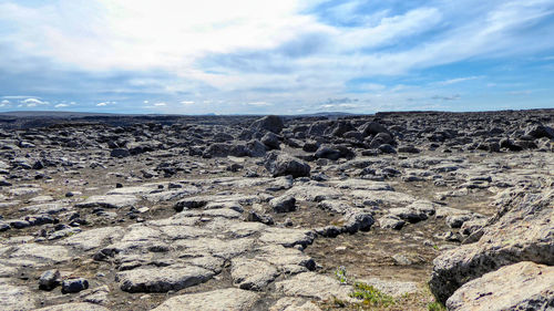 Rocks on land against sky