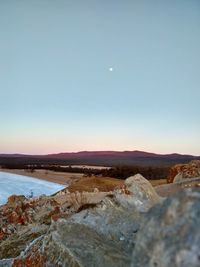 Scenic view of land against clear sky