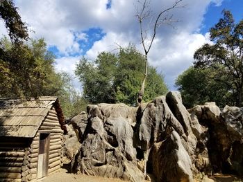 Low angle view of rocks against sky