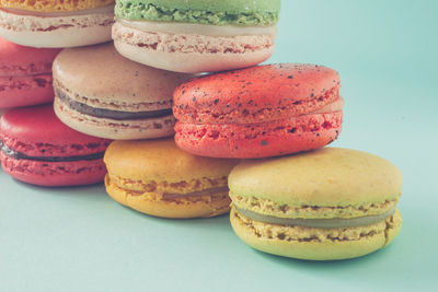 Close-up of multi colored candies against white background