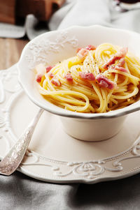 Close-up of noodles in bowl on table