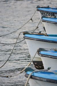 Close-up of boats in water