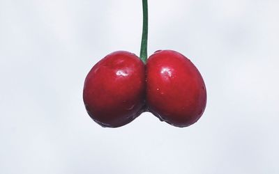 Close-up of strawberry against white background