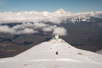 Scenic view of snowcapped mountain against sky