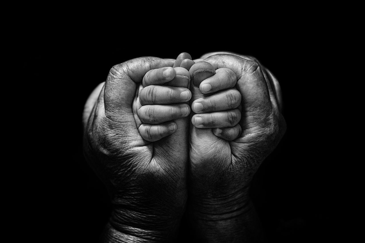 human hand, hand, black background, human body part, studio shot, indoors, body part, close-up, people, positive emotion, finger, human finger, emotion, child, unrecognizable person, real people, men, babyhood, baby, human limb, aggression