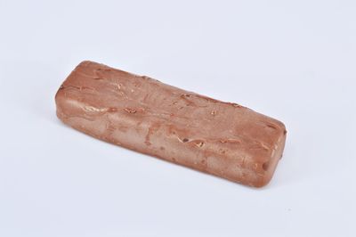 Close-up of bread against white background