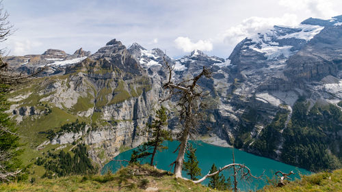 Scenic view of snowcapped mountains against sky