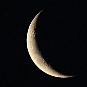 Close-up of moon over black background