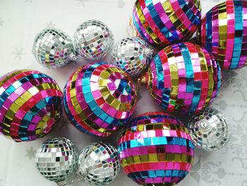 High angle view of colorful baubles on table