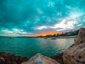 Panoramic view of sea against dramatic sky