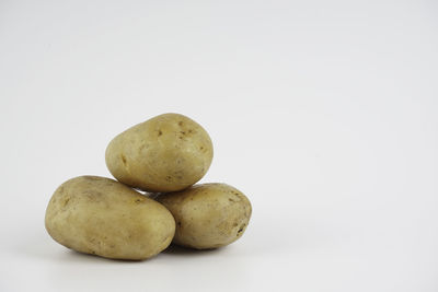 Close-up of fruits against white background