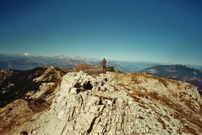 Scenic view of mountains against clear blue sky