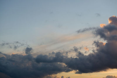 Low angle view of clouds in sky during sunset