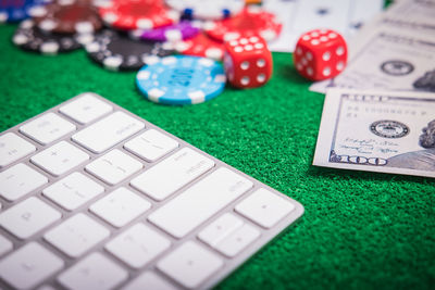 Close-up of cards and gambling chips on table