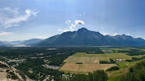 Scenic view of landscape and mountains against sky