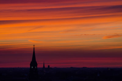 Scenic view of dramatic sky at sunset