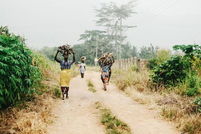 Women walking on road