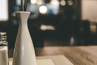 Close-up of vase on table at home