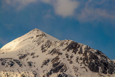 Scenic view of snowcapped mountain against sky