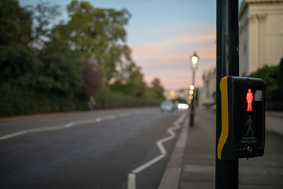 Road sign on street in city