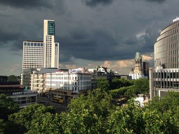 Low angle view of building against cloudy sky