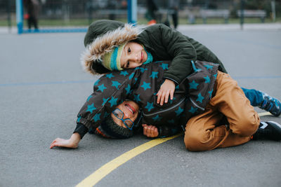 Portrait of boys on street in city