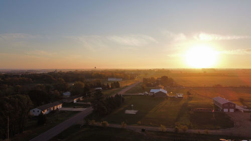 High angle view of buildings against sky during sunset