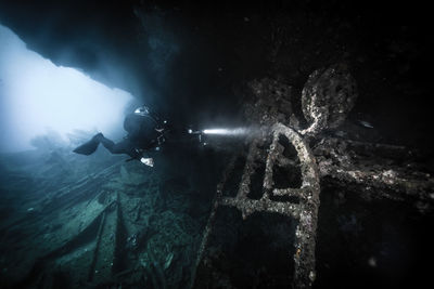 Woman scuba diving undersea