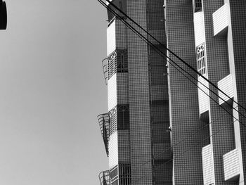 Low angle view of modern building against clear sky