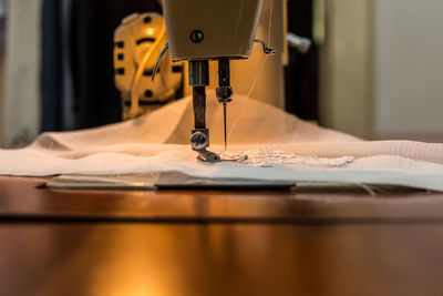 Close-up of fabric on sewing machine