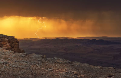 Scenic view of mountains against sky during sunset