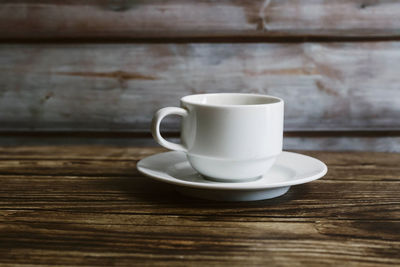 Close-up of coffee cup on table