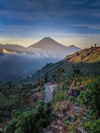 Scenic view of mountains against sky during sunset