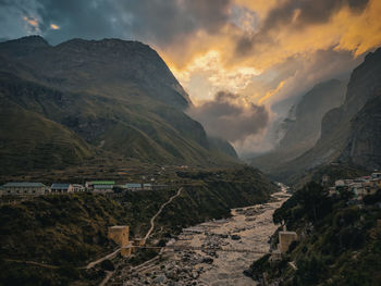 Scenic view of mountains against sky during sunset
