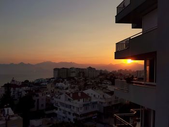 High angle view of buildings against sky during sunset. lara, antalya, turkey