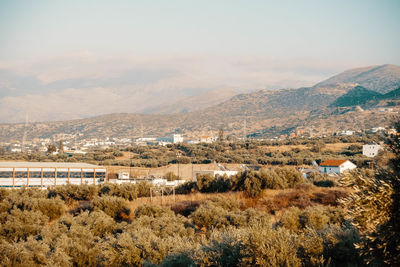 Scenic view of townscape against sky