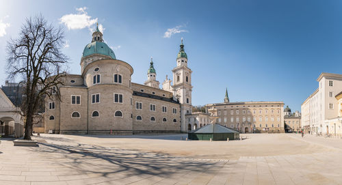 The cathedral of salzburg, austria surrounded by empty squares during the corona virus crisis.