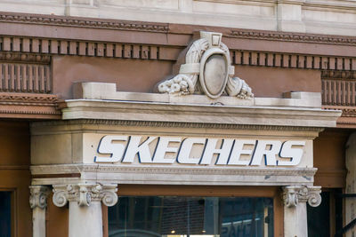 Low angle view of statue against building