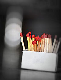 Close-up of matchsticks in box
