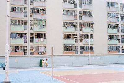 People standing in front of building