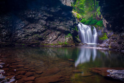 Scenic view of waterfall in forest