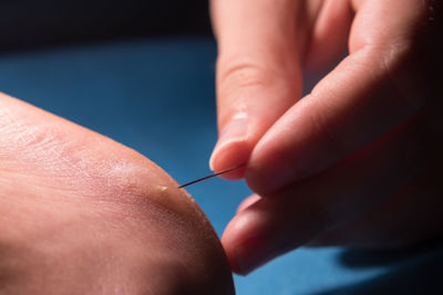 Close-up of woman holding hands